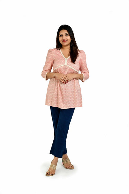 Blush pink color and the elegant charm top - The Bebla
