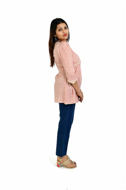 Blush pink color and the elegant charm top - The Bebla